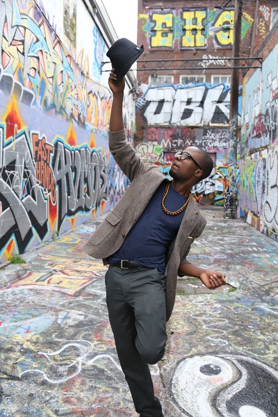 Preston posing in graffiti alley